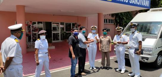 NPOL Scientists hands over sanitizer bottles developed by NPOL to the Indian Navy