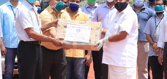 Shri S Vijayan Pillai, Director NPOL hands over sanitizer bottles developed by NPOL  to Hon’ble Minister for Agriculture, Kerala